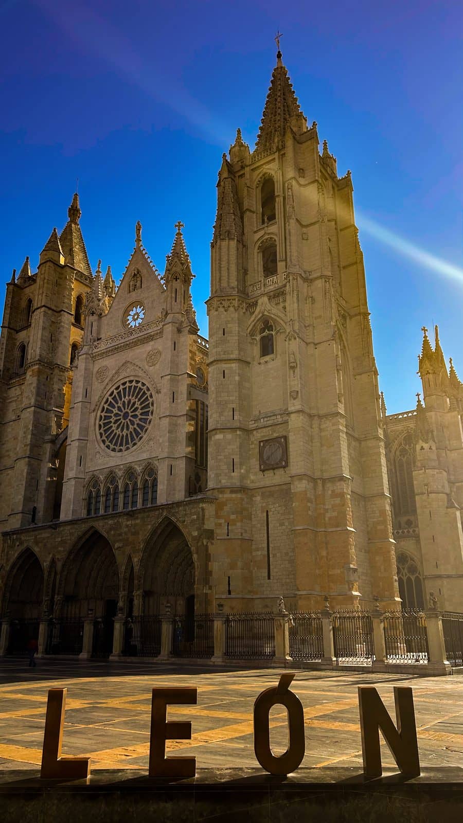 León Cathedral's Gothic towers rising behind the city's large LEÓN letters.